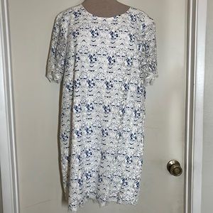 White lace dress with blue accents